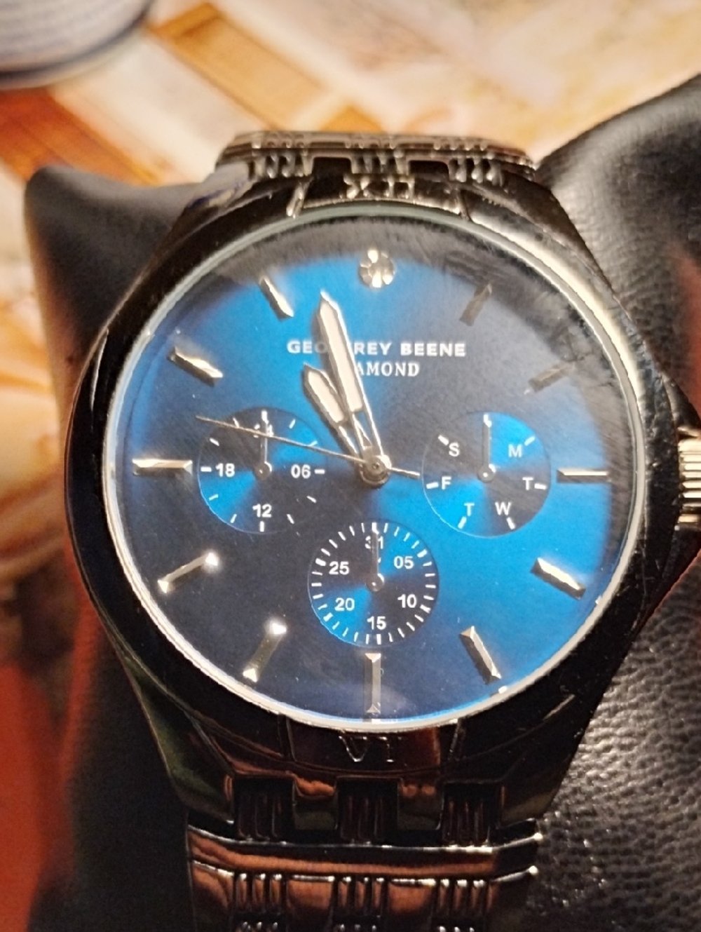 Geoffrey Beene Men’s Metallic Blue Dial Stainless Watch
